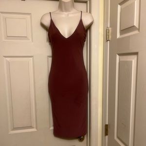 “Fashions a Dress”